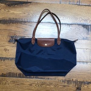 Longchamp large foldable tote.